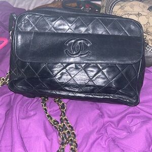 Chanel vintage bag . Front pocket has a tear inside pocket